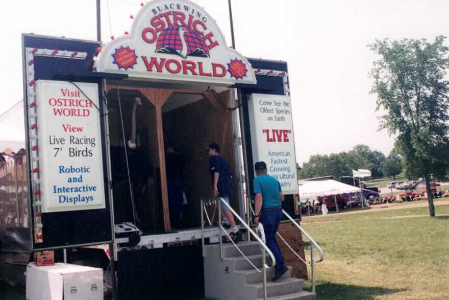 Entrance to the Blackwing Ostrich World trailer at a community fair
