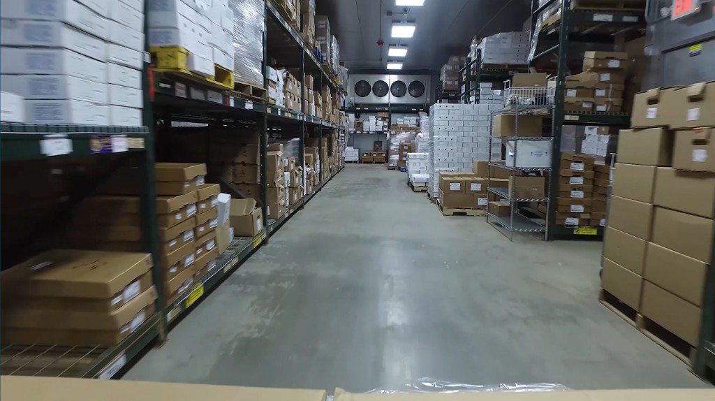 Cold storage warehouse aisle stocked with Blackwing inventory